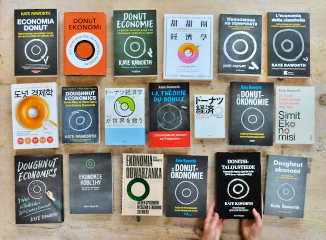 Doughnut Economics book covers for editions in multiple languages.